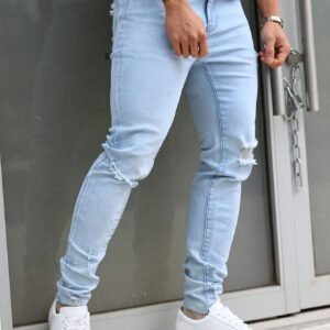 Jeans pour hommes déchirés lavage clair élastiques