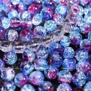 50pcs de perles en verre craquelé flocon de neige de 10 mm en blocs de couleurs bleu foncé, bleu clair et violet prune foncé. Ces perles transparentes et scintillantes sont parfaites pour la fabrication de bijoux faits à la main et sont idéales pour les ajouts de perles pour les bracelets.